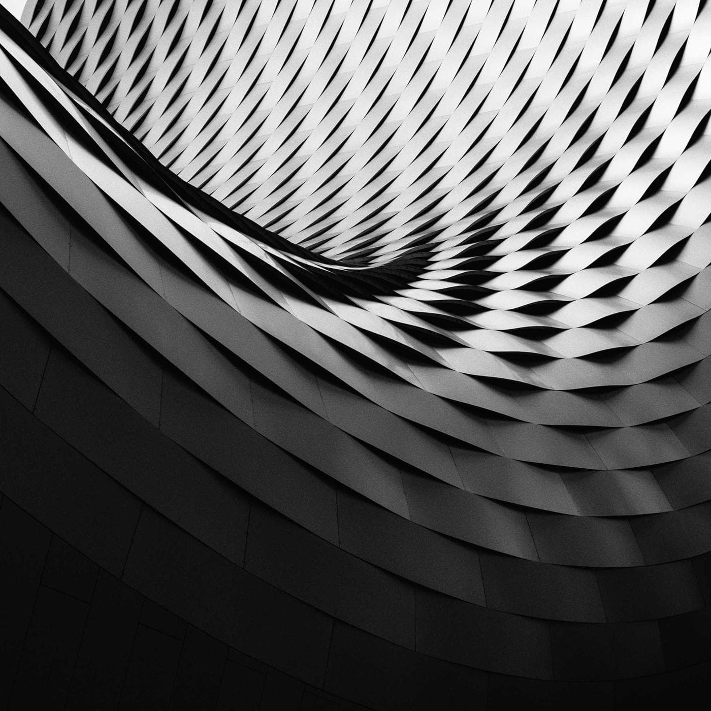 Curved building facade in black and white